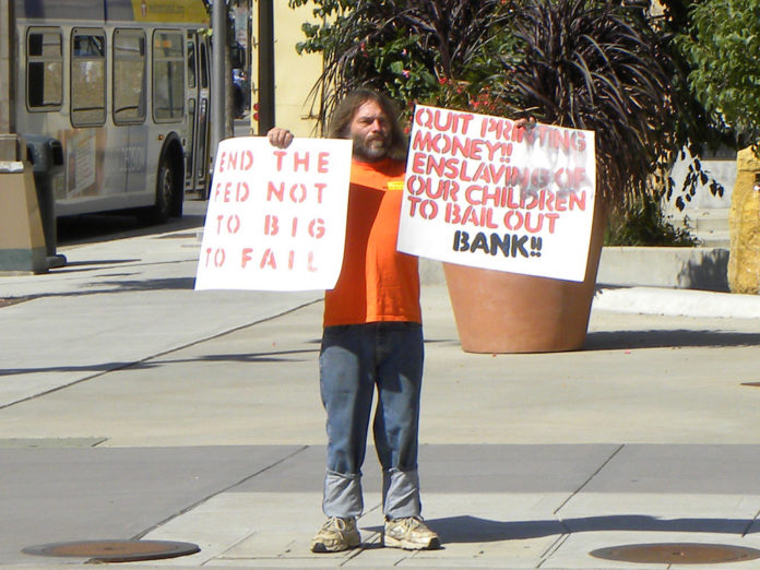 Protest against the Federal Reserve during event with Chairman Ben Bernanke